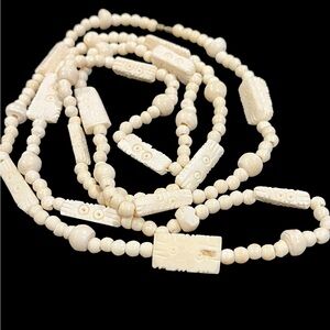 Vintage carved celluloid bone look long necklace